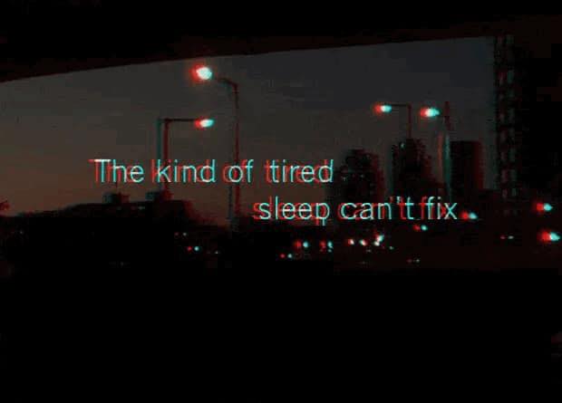 This meme is a darkly humorous image with a cityscape in the background. The text "The kind of tired sleep can't fix" is written in a futuristic, neon-like font, implying that even a good night's sleep won't be enough to alleviate the speaker's exhaustion. The overall tone is one of irony and frustration, implying that even the most restful sleep can't provide a solution to the speaker's exhaustion.